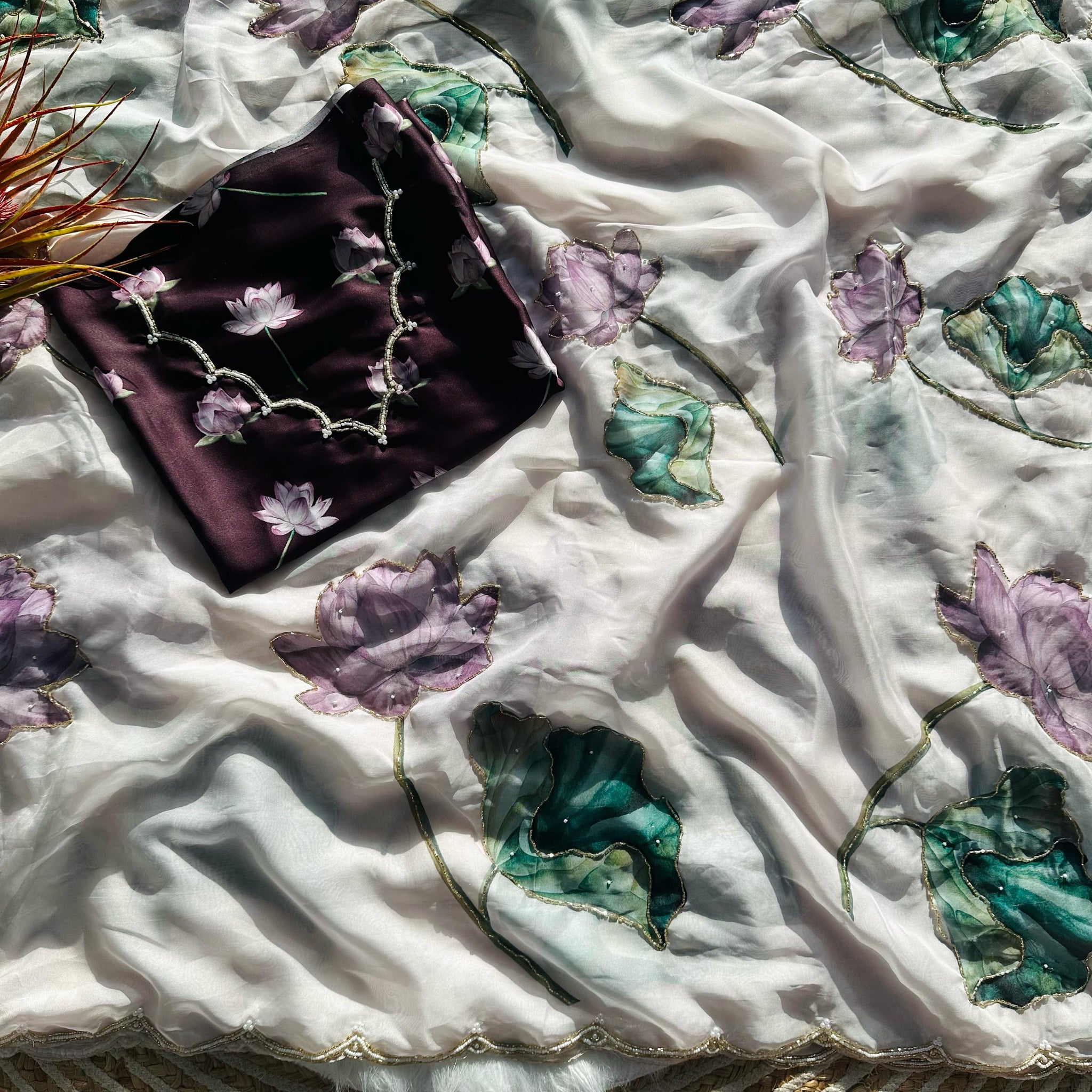 Luxurious Deep Soft mulmul organza with Beautiful print cover with handcrafted work all over saree