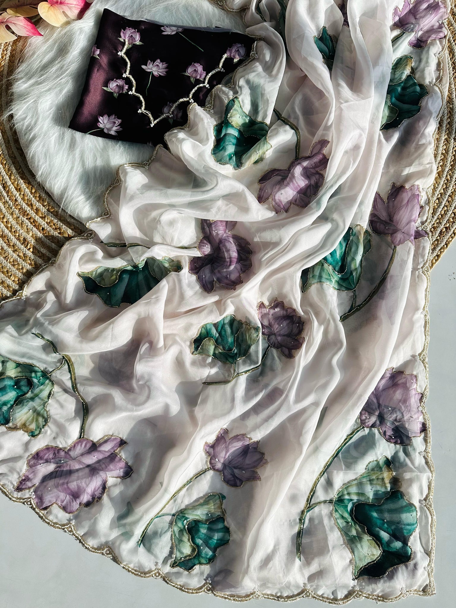 Luxurious Deep Soft mulmul organza with Beautiful print cover with handcrafted work all over saree